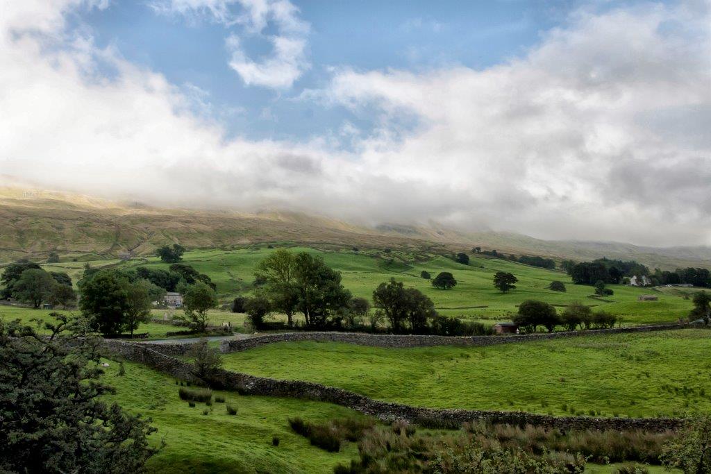 View towards Nine Standards Rigg peak and Swaledale, by Andy Merritt