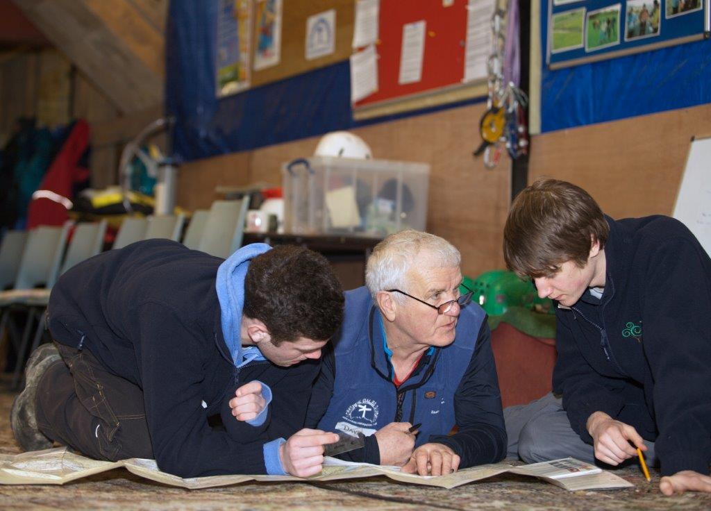 The trainees brush up on their map reading skills