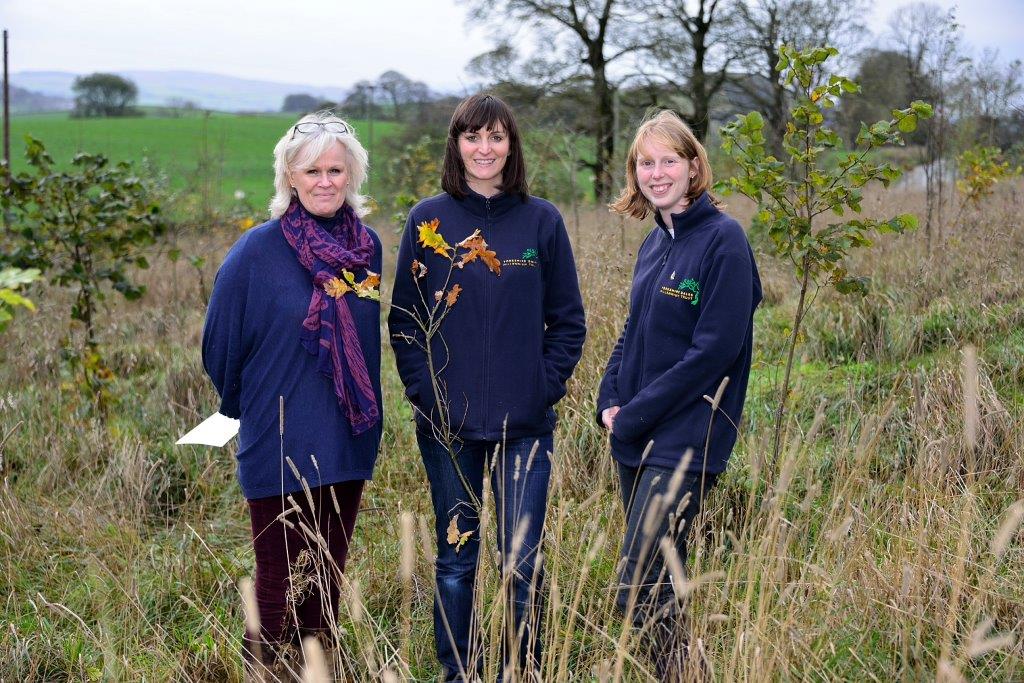 L-R: Liz Marshall from AIT with Lindsay Wallace and Sarah Brewer from YDMT at the new woodland