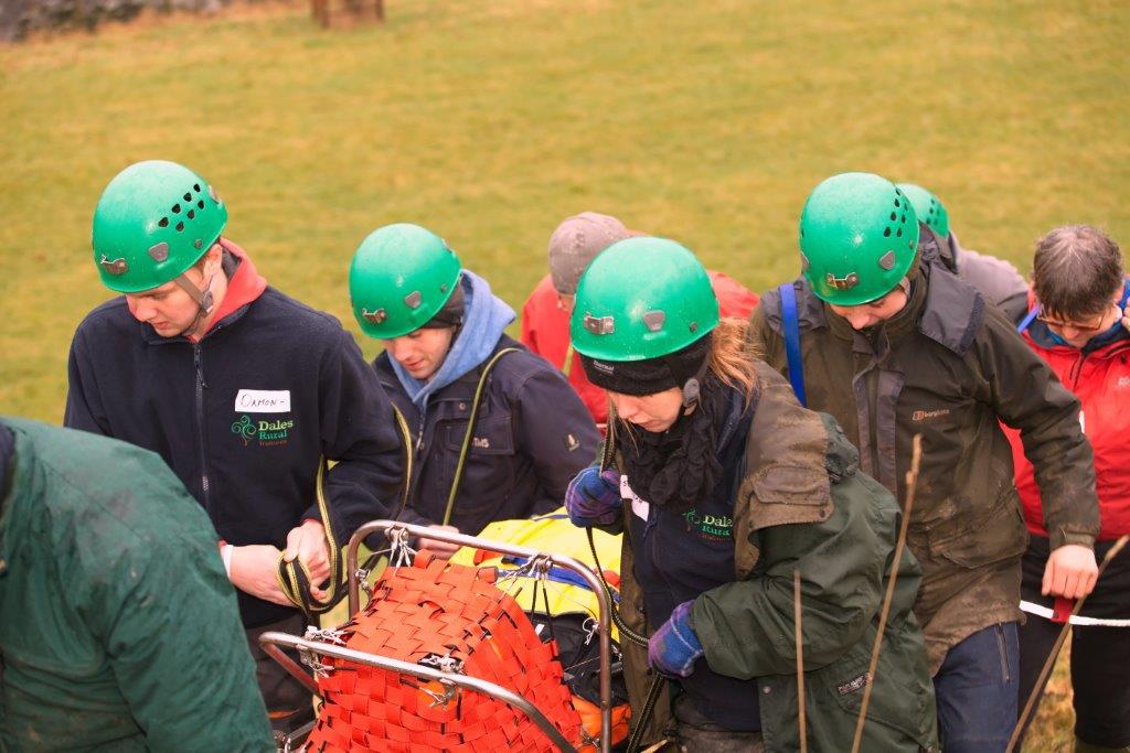 The trainees 'rescue' YDMT's Jo Boulter from a 'dangerous accident' by the riverside!