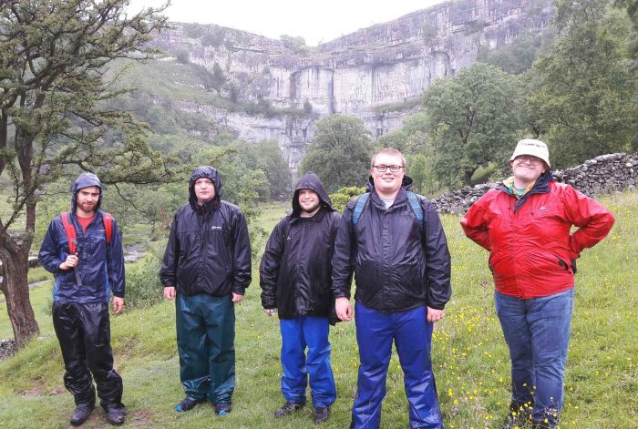 Special Autism Services visit a rainy Malham Cove