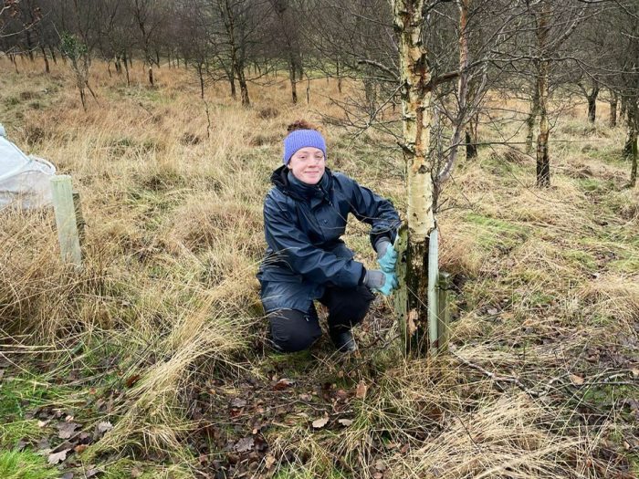 Chloe at one of YDMT's plastic free tree guards trial sites 
